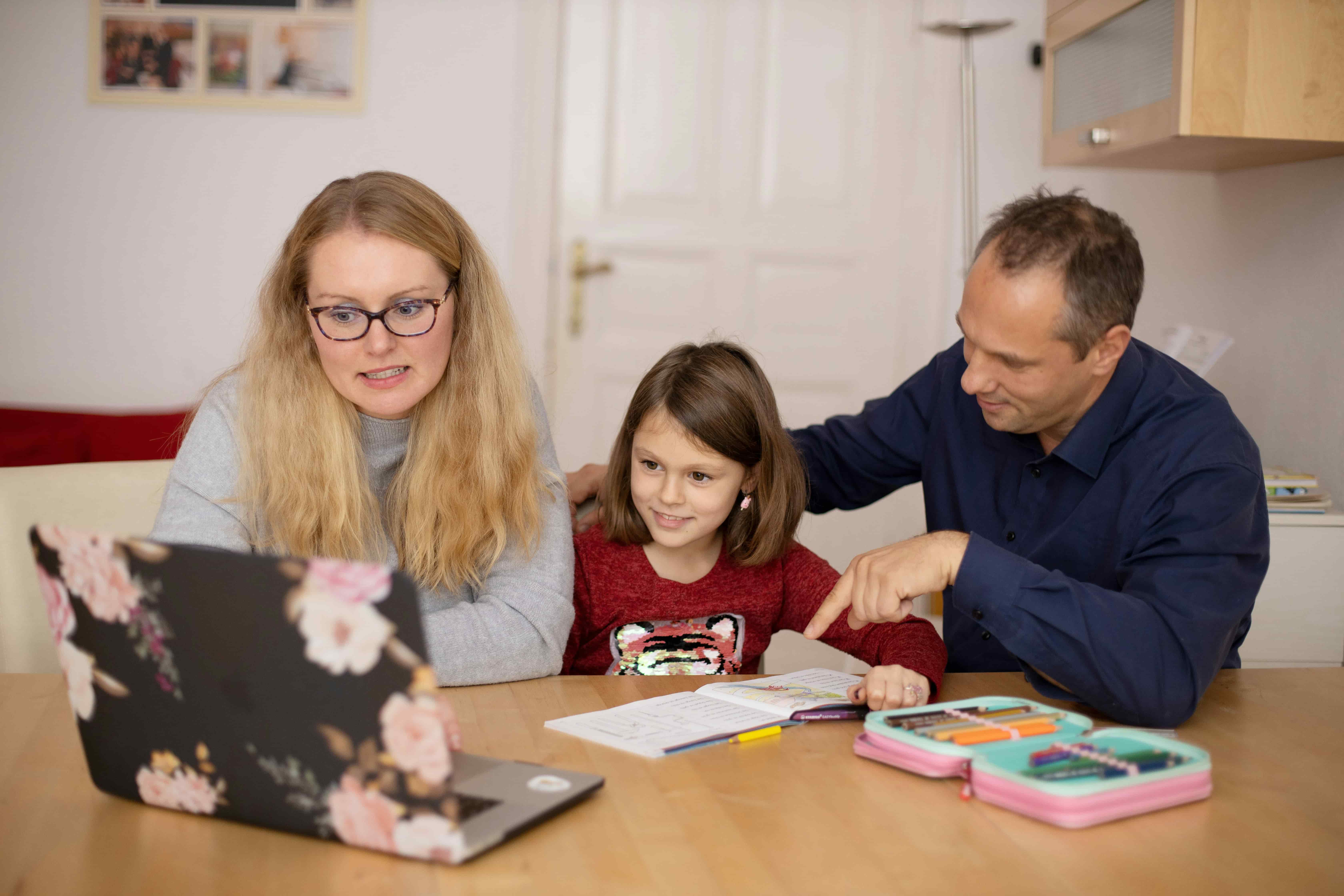 Tutor working closely with a student